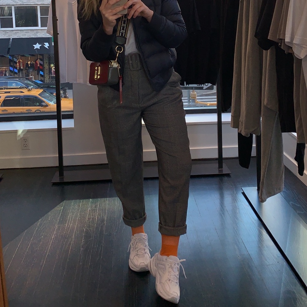 Belted high-waisted plaid trousers